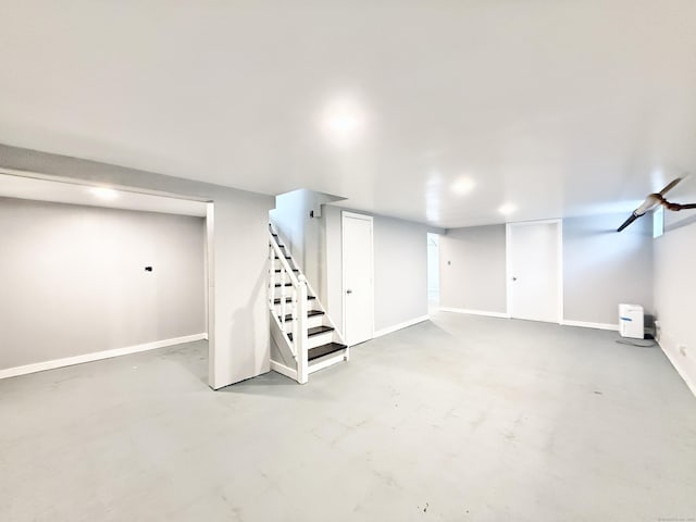 10 Meadowpark Ave W, Stamford, CT 06905 - finished basement featuring stairway and baseboards
