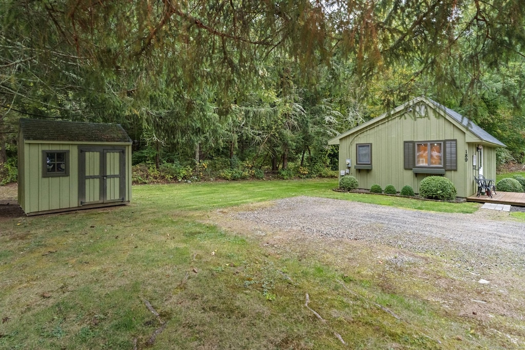 189 Chaplin Rd, Eastford, CT 06242 - view of green lawn featuring a storage shed