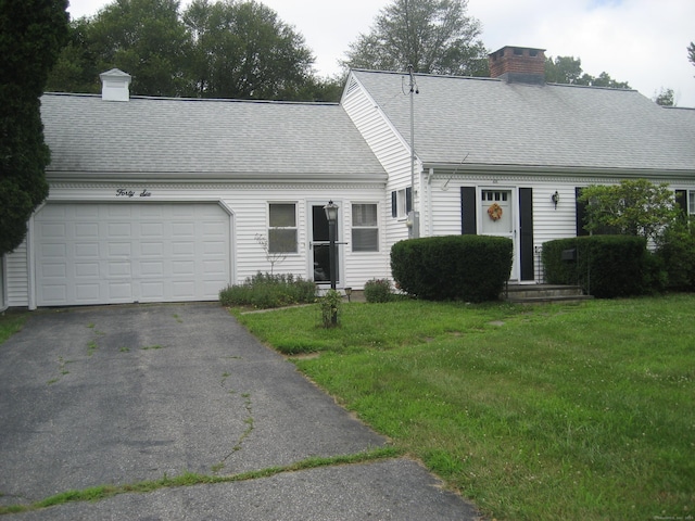 46 Wayne St, Norwich, CT 06360 - new england style home featuring a chimney, an attached garage, driveway, a front yard, and a shingled roof