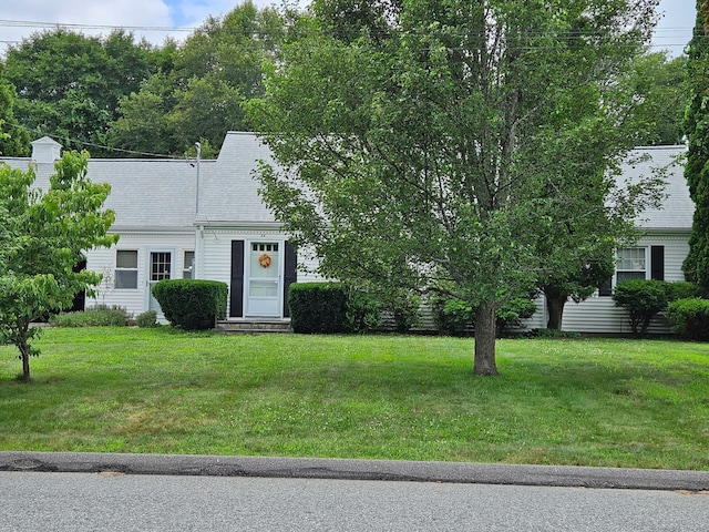 46 Wayne St, Norwich, CT 06360 - view of front of property with a front yard and roof with shingles