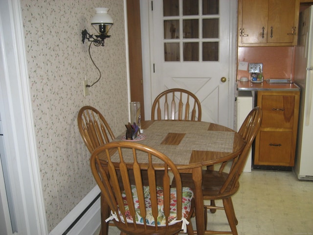 46 Wayne St, Norwich, CT 06360 - dining space with wallpapered walls and light floors
