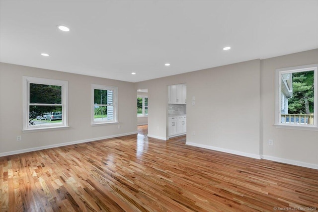 219 Browning Rd, Norwich, CT 06360 - unfurnished room with healthy amount of natural light, light wood-style flooring, and recessed lighting