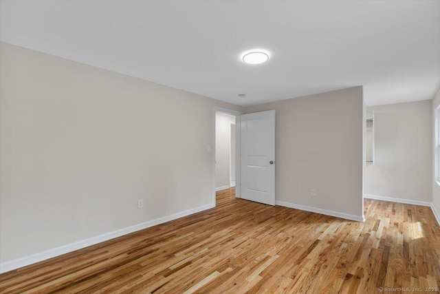 219 Browning Rd, Norwich, CT 06360 - empty room with light wood-style flooring and baseboards