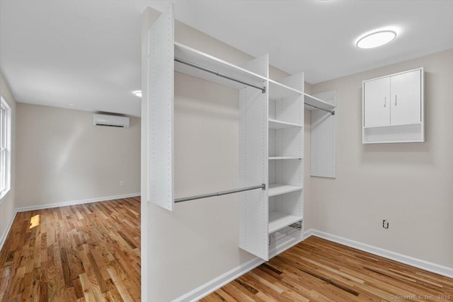 219 Browning Rd, Norwich, CT 06360 - spacious closet with a wall unit AC and wood finished floors