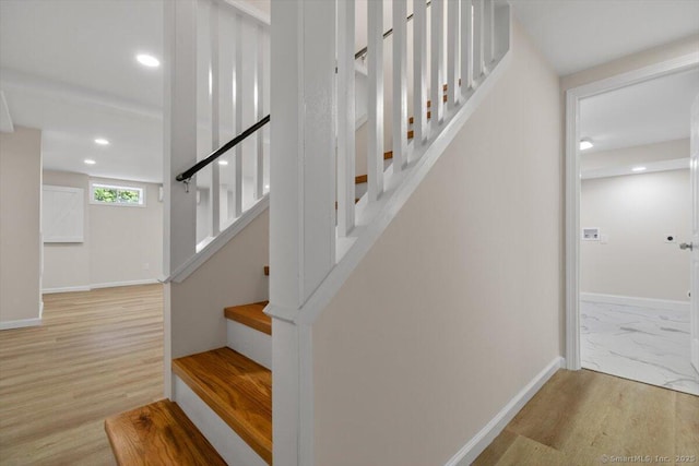 219 Browning Rd, Norwich, CT 06360 - stairway with recessed lighting and wood finished floors