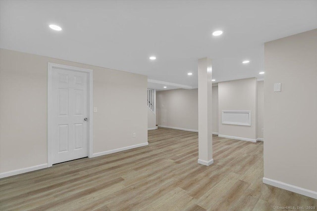 219 Browning Rd, Norwich, CT 06360 - finished basement with light wood-style flooring and recessed lighting