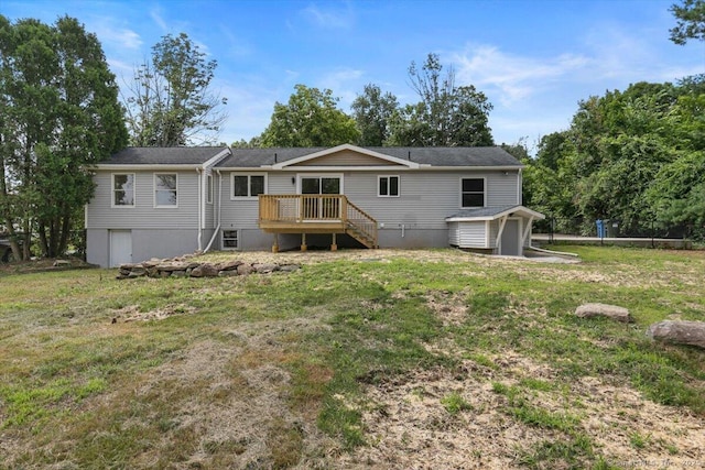 219 Browning Rd, Norwich, CT 06360 - rear view of house with a yard, a wooden deck, a shed, and stairs