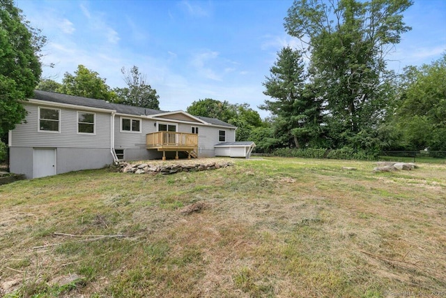 219 Browning Rd, Norwich, CT 06360 - view of green lawn featuring a deck