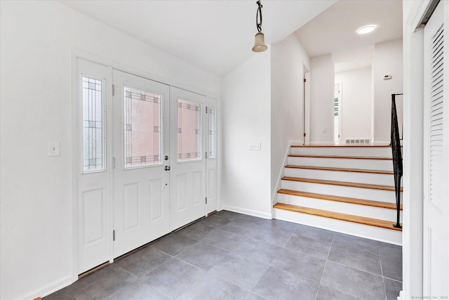 195 Whittier Rd, New Haven, CT 06515 - tiled entrance foyer featuring stairs and baseboards
