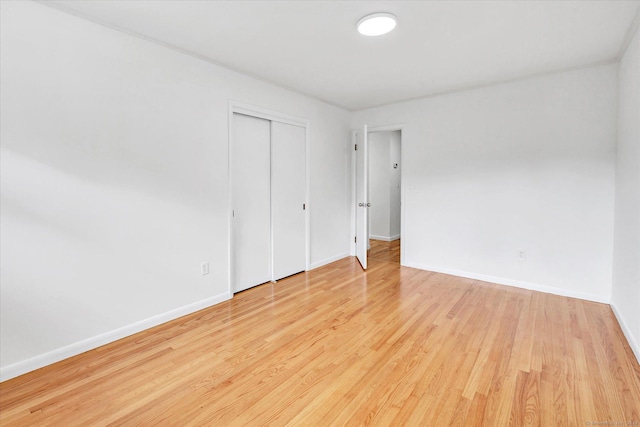 195 Whittier Rd, New Haven, CT 06515 - unfurnished bedroom with light wood-style flooring and a closet