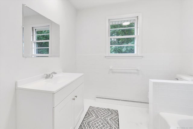 195 Whittier Rd, New Haven, CT 06515 - full bathroom featuring vanity, a bathtub, tile walls, and a wainscoted wall
