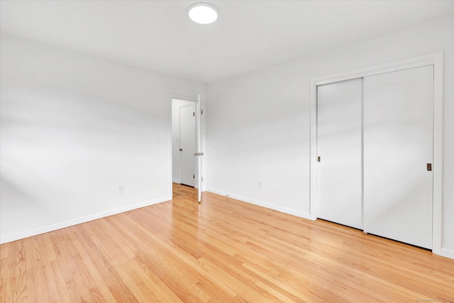 195 Whittier Rd, New Haven, CT 06515 - unfurnished bedroom featuring light wood finished floors and a closet
