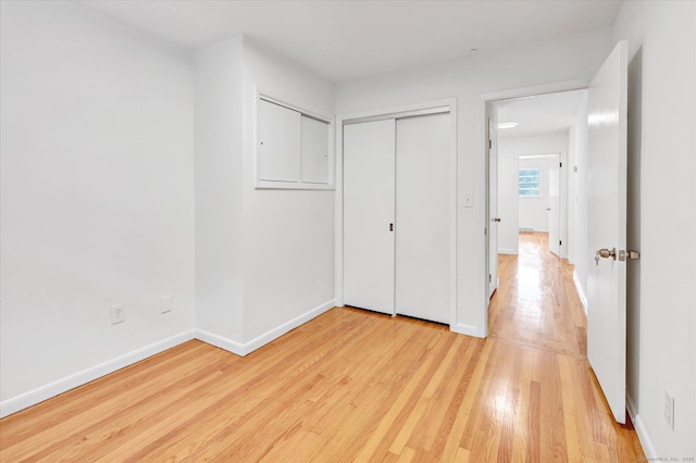 195 Whittier Rd, New Haven, CT 06515 - unfurnished bedroom featuring light wood finished floors and a closet
