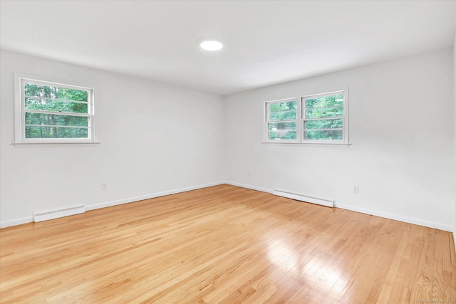 195 Whittier Rd, New Haven, CT 06515 - spare room with baseboard heating and wood finished floors