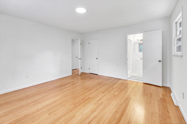 195 Whittier Rd, New Haven, CT 06515 - unfurnished bedroom featuring light wood-style flooring and ensuite bathroom