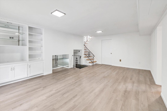 195 Whittier Rd, New Haven, CT 06515 - basement featuring stairs and light wood-type flooring