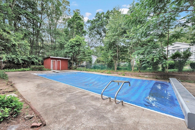 195 Whittier Rd, New Haven, CT 06515 - view of swimming pool with a storage shed, a covered pool, and a diving board
