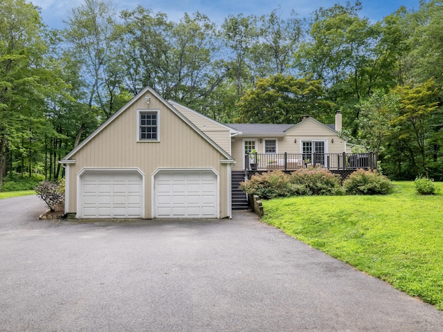 322 Mountain Rd, Wilton, CT 06897 - view of front of house with driveway, a front lawn, a garage, and a wooden deck