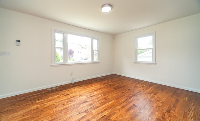 112 Pitt St, Bridgeport, CT 06606 - spare room featuring wood finished floors and baseboards