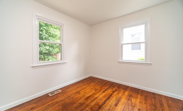 112 Pitt St, Bridgeport, CT 06606 - empty room with baseboards and wood finished floors