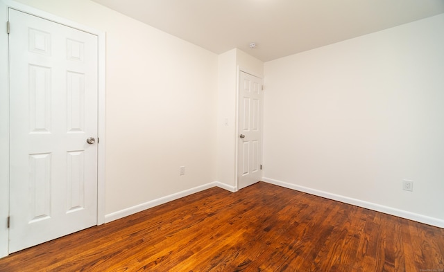 112 Pitt St, Bridgeport, CT 06606 - unfurnished room with wood finished floors and a smoke detector