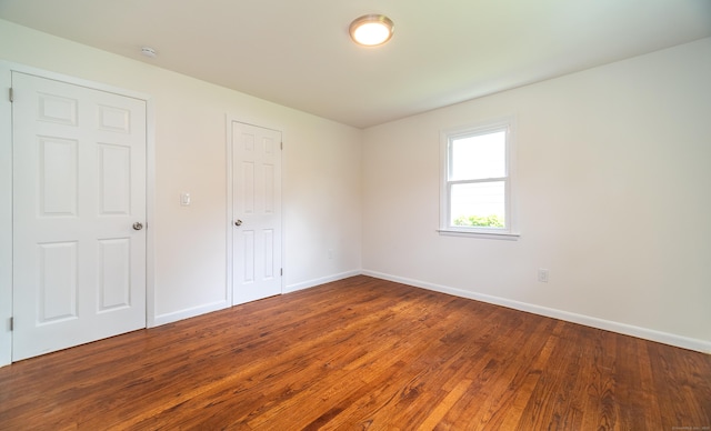 112 Pitt St, Bridgeport, CT 06606 - unfurnished bedroom with wood finished floors and baseboards