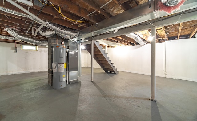 112 Pitt St, Bridgeport, CT 06606 - basement featuring water heater and stairs