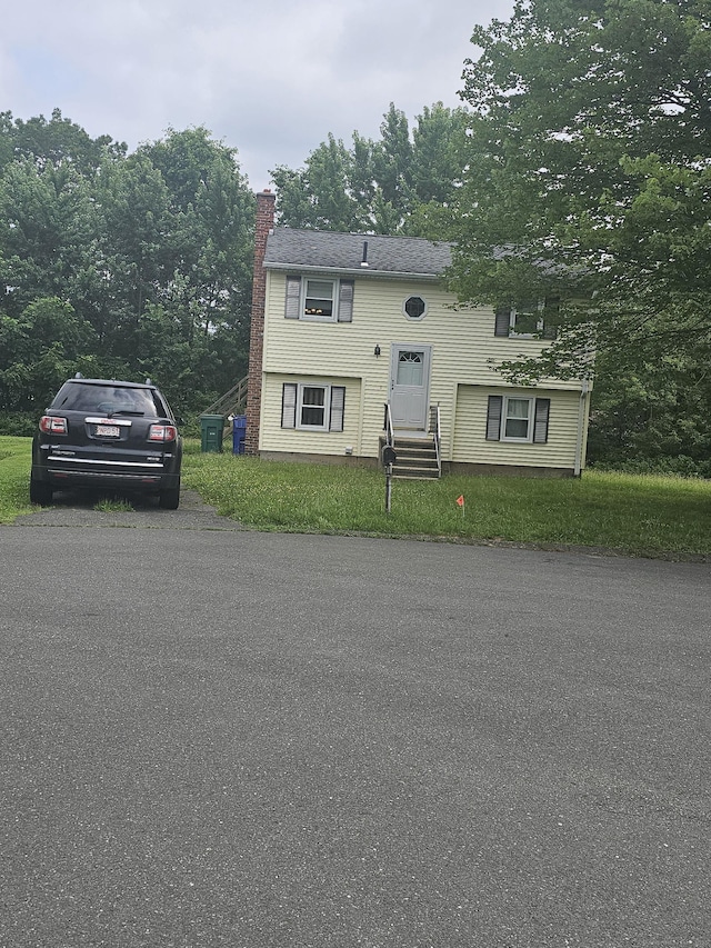 18 Sandra Dr, Bloomfield, CT 06002 - raised ranch with entry steps and a chimney