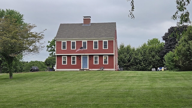 222 Gilead St, Hebron, CT 06248 - colonial home featuring a front lawn and a chimney