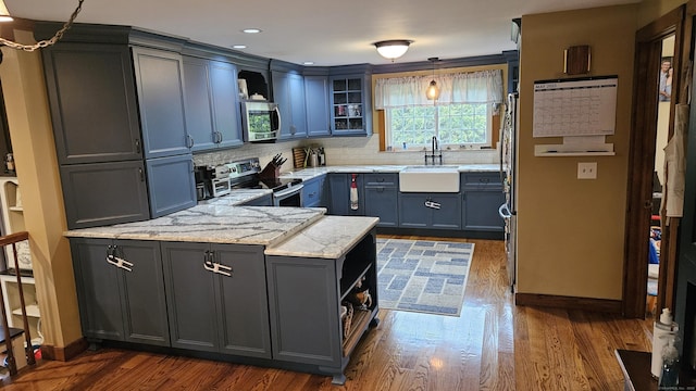 222 Gilead St, Hebron, CT 06248 - kitchen featuring stainless steel appliances, a peninsula, dark wood finished floors, open shelves, and recessed lighting