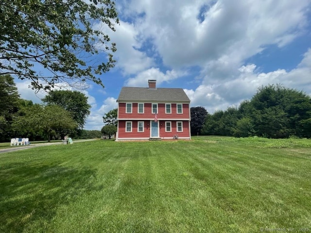 222 Gilead St, Hebron, CT 06248 - colonial home with a front yard and a chimney