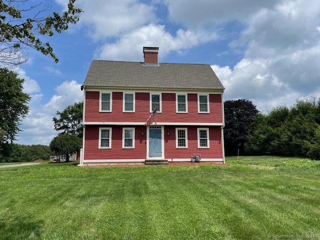 222 Gilead St, Hebron, CT 06248 - view of front of property featuring a chimney and a front yard