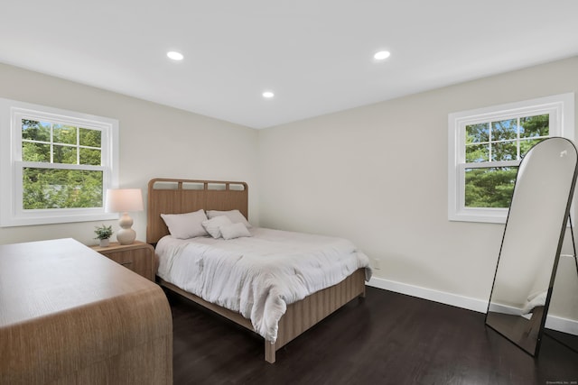 39 Cambridge Dr, Greenwich, CT 06831 - bedroom with multiple windows, wood finished floors, and recessed lighting