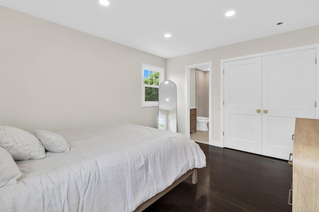39 Cambridge Dr, Greenwich, CT 06831 - bedroom with dark wood-type flooring, recessed lighting, and ensuite bathroom