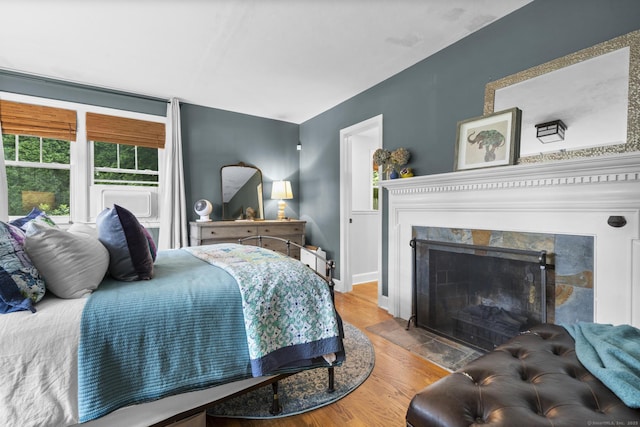 123 George St, Middletown, CT 06457 - bedroom with wood finished floors and a tiled fireplace