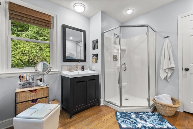 123 George St, Middletown, CT 06457 - full bath featuring a stall shower, vanity, wood finished floors, and a textured ceiling