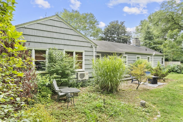 123 George St, Middletown, CT 06457 - back of property with a chimney