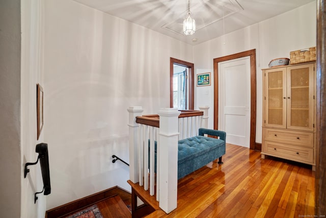 135 Park Ter, Waterbury, CT 06708 - hall with attic access, an upstairs landing, and light wood finished floors