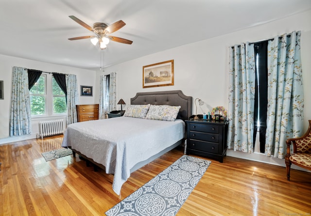 135 Park Ter, Waterbury, CT 06708 - bedroom featuring radiator heating unit, wood finished floors, and ceiling fan