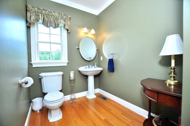 190 Shadow Pond, Suffield, CT 06078 - half bath featuring wood finished floors and ornamental molding