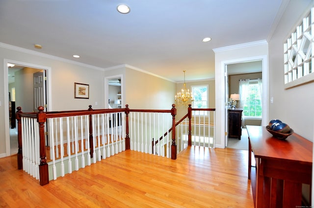 190 Shadow Pond, Suffield, CT 06078 - hallway with an upstairs landing, light wood-style flooring, a chandelier, recessed lighting, and ornamental molding