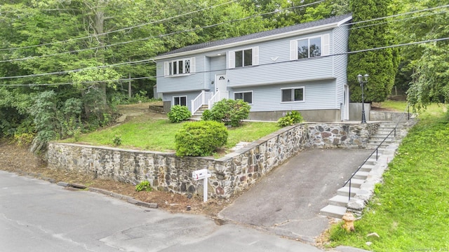 302 Fieldwood Rd, Waterbury, CT 06704 - split foyer home with a front yard