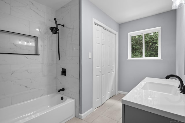 302 Fieldwood Rd, Waterbury, CT 06704 - bathroom with washtub / shower combination, vanity, a closet, and tile patterned flooring