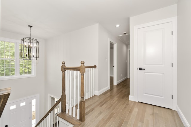 61 N Woods Rd, Hamden, CT 06518 - hall featuring an upstairs landing, a chandelier, light wood-style flooring, attic access, and recessed lighting