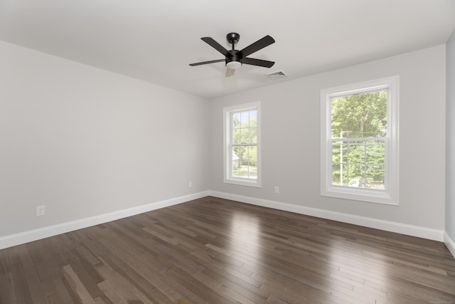 61 N Woods Rd, Hamden, CT 06518 - spare room featuring healthy amount of natural light, ceiling fan, and dark wood-style flooring