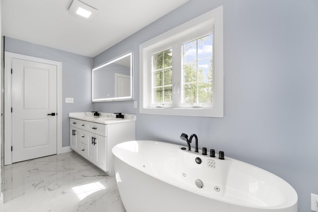 61 N Woods Rd, Hamden, CT 06518 - bathroom with a soaking tub, marble finish floors, and vanity