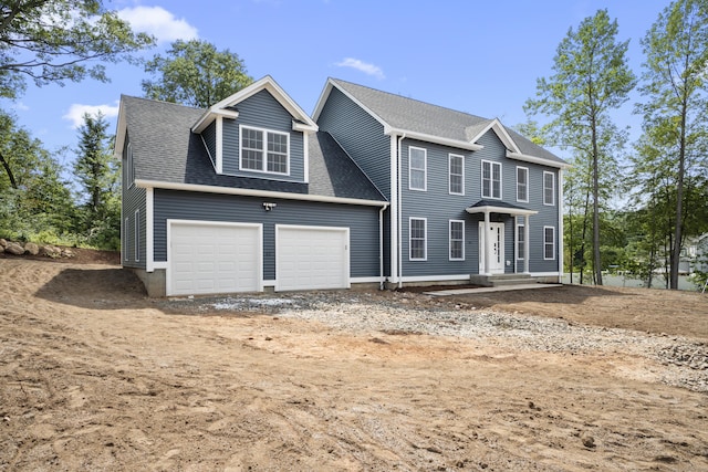 61 N Woods Rd, Hamden, CT 06518 - colonial-style house with a shingled roof and driveway