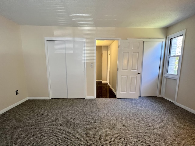 280 Gardner Ave Unit D4, New London, CT 06320 - unfurnished bedroom with multiple closets and carpet flooring