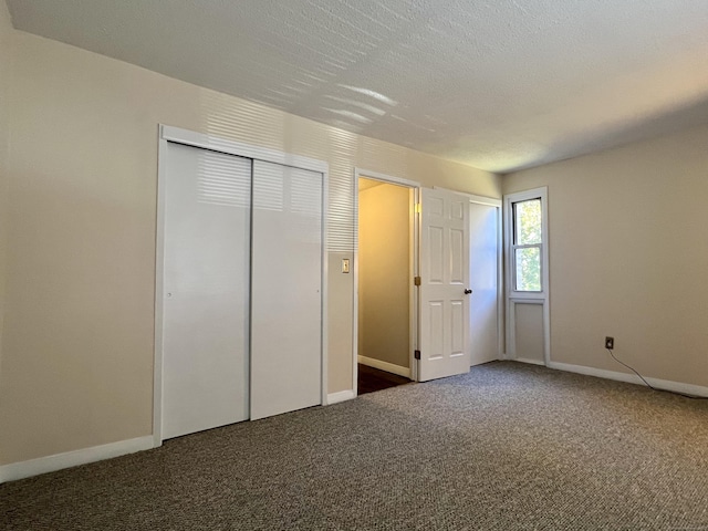 280 Gardner Ave Unit D4, New London, CT 06320 - unfurnished bedroom with carpet and two closets