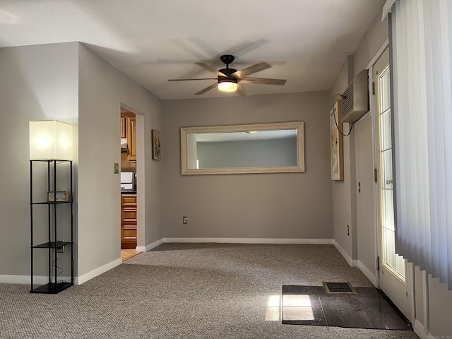 280 Gardner Ave Unit D4, New London, CT 06320 - unfurnished bedroom featuring dark colored carpet, an AC wall unit, and a ceiling fan